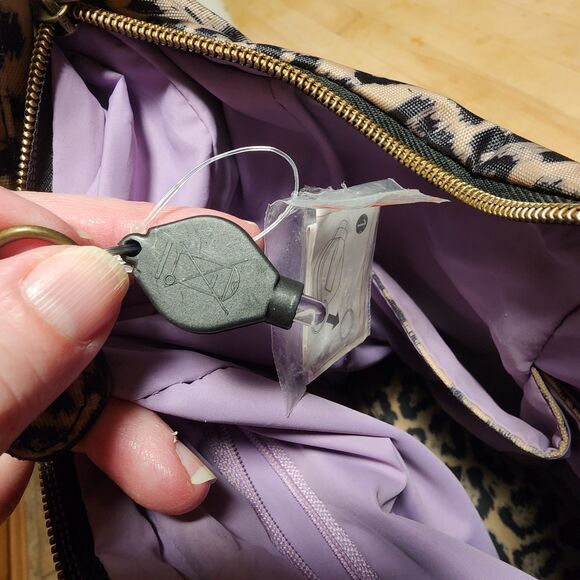 Travelon Animal Print Crossbody Bag - Picture 7 of 12